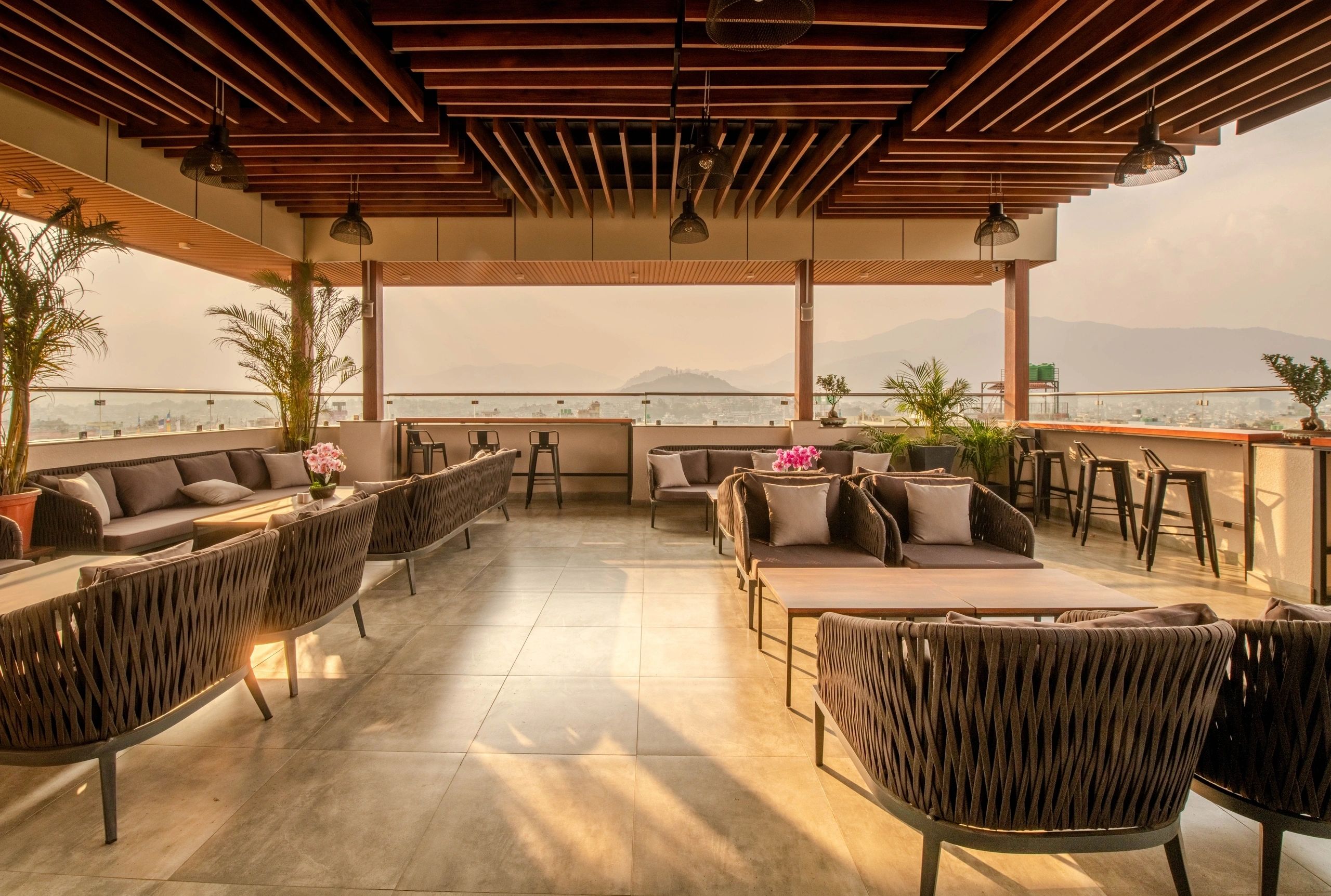 Evening Rooftop Terrace Bar with Candlelit Dining