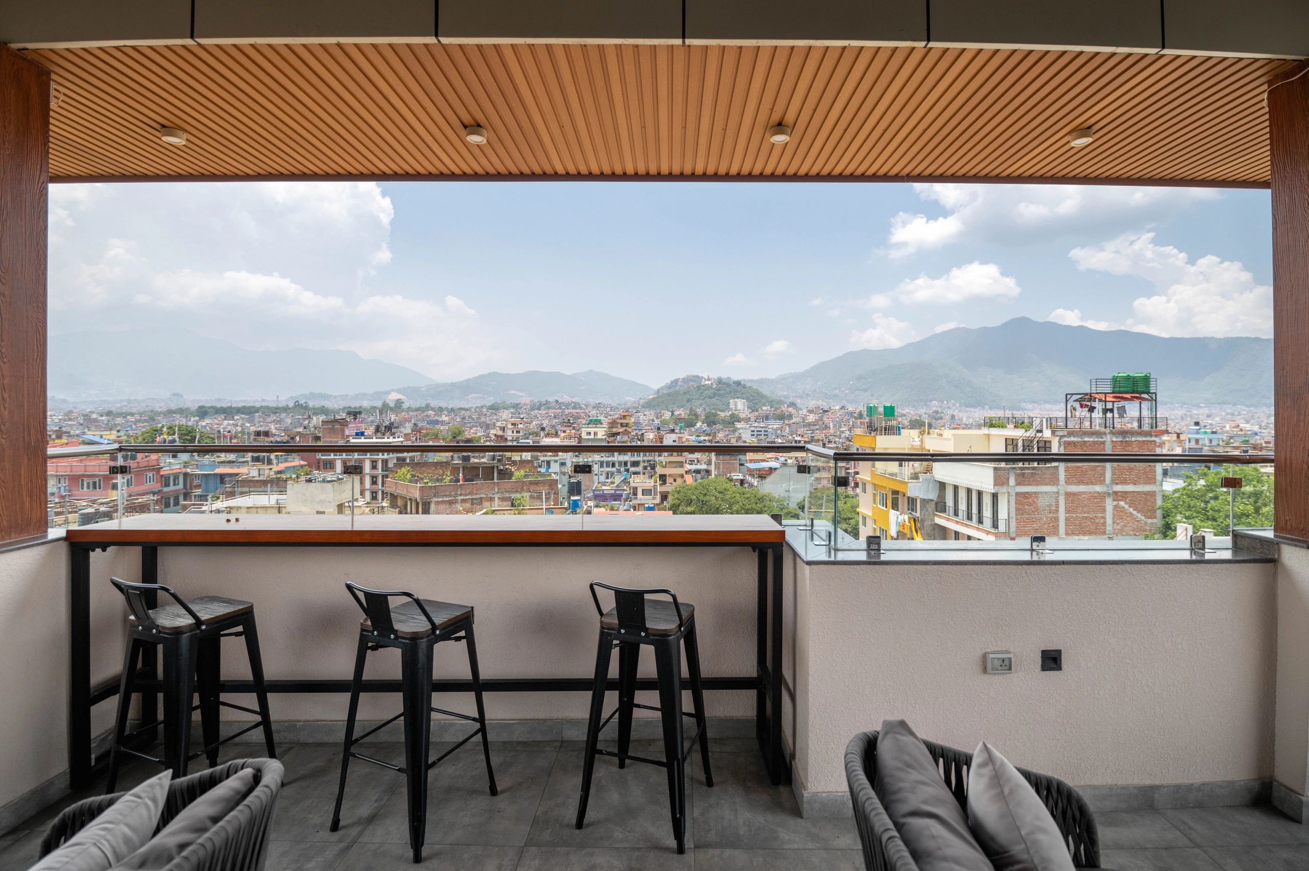 Mila Hotel rooftop at sunset — Kathmandu skyline